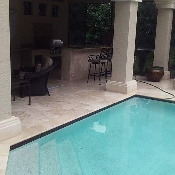 If you are interested in installing new pool tiles, then it's time to do something about it. Our specialists at tile installation Hollywood FL can help you transform your swimming space into an oasis that will have all of your friends envious. We're ready to tackle any size project, so give us a call today. In this picture, you see our latest tile installation project in Hollywood FL. The picture was taken in August 2021.